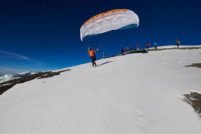 Tandem paragliding over the Moshi foothills